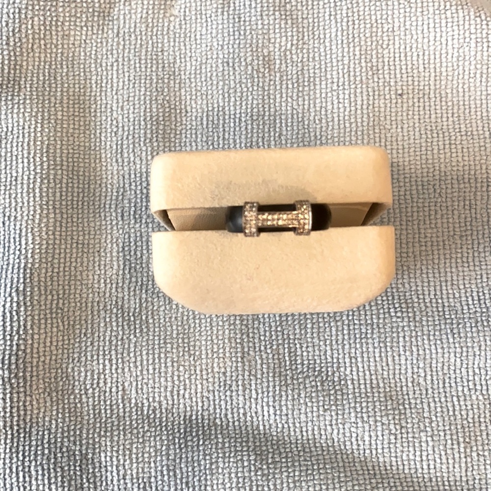 Beautiful black band ring with silver bar